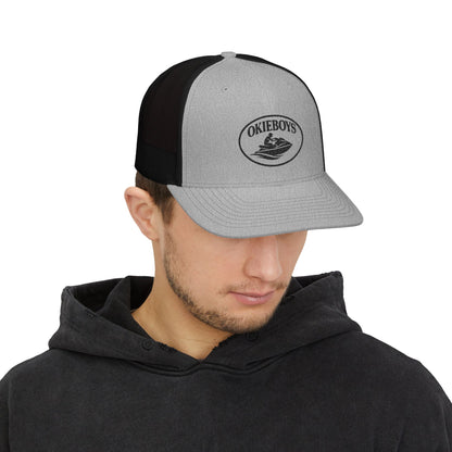 Embroidered Trucker Cap — Classic Black & White Snapback with Oval Logo